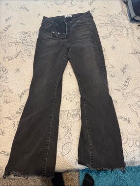 Women's Black Flared Jeans with Raw Hem
